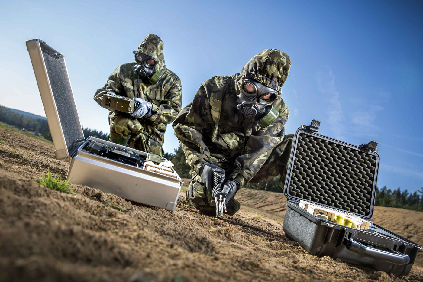 Two soldiers wearing the CM-7M Military Hazmat Mask